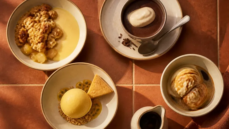 Selection of desserts including apple crumble, chocolate pot, passion fruit sorbet, and affogato